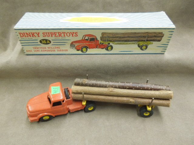 Dinky Toy Log Carrier # 36A: Dinky Super Toys log carrier # 36a, made in France, tractor Willeme' Avec semi-Remorque Fardier, "Willeme tractor & lumber carrier, red cab, yellow log carrier with five "logs", spare tire, original b