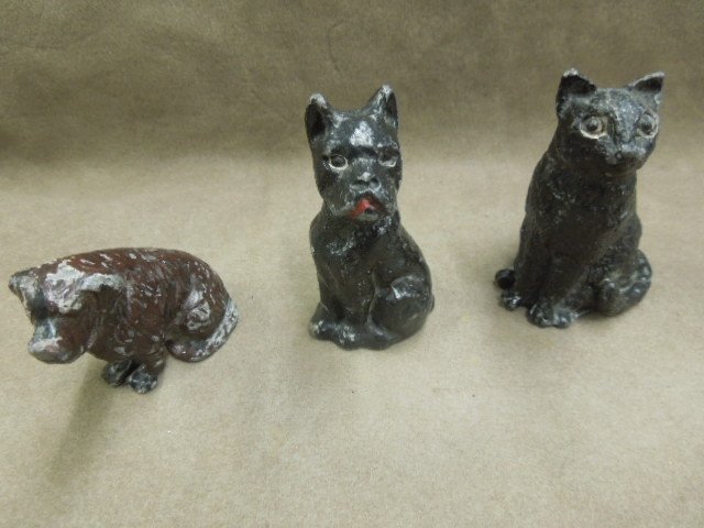 3 Lead Animal Figures: Three lead animal figures, two dogs, mastiff, 2 1/8"h brown with black & red accents, Scottie 2 3/4" h, black & one cat 2 7/8". CONDITION: Paint loss on all pieces, especially mastiff.