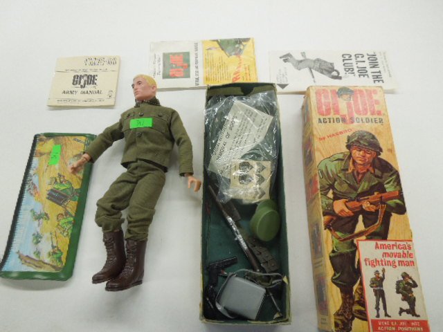 G I Joe Action Figure: G I Joe Action Soldier figure by Hasbro, 1964 with original box, clothing, dog tags and accessories, Army manual, gear and equipment manual, G I Joe Club pamphlet, plus Combat Man's pencil case, 1965,