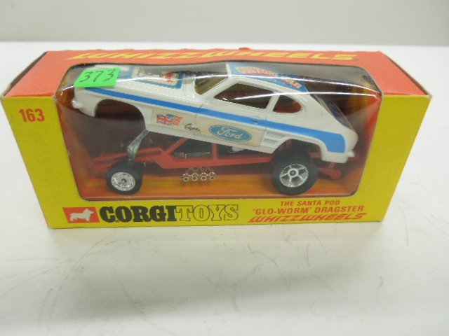 Corgi Toy car # 163: Corgi Toy car # 163, Whizz Wheels, The Santa Pod, "Glo - Worm" dragster, white body, Ford stickers, red chassis, driver, original box, 4" Condition; box and car have minor wear