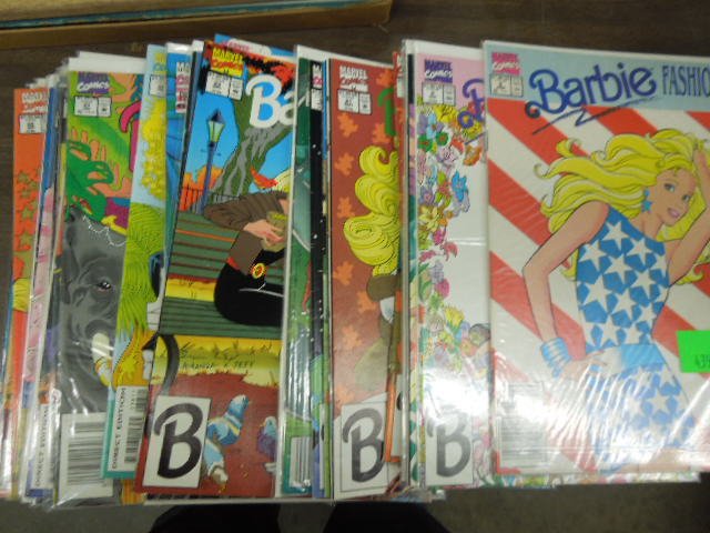 31 Barbie Comic books: 31 Barbie Comic books, Marvel including; (14) Barbie Fashion, (16) Barbie and (1) Flying Hero Barbie, most in plastic bags Condition; no issues noted