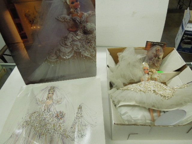 Bob Mackie "Empress Bride" Barbie: Bob Mackie "Empress Bride" Barbie, 5th in a series, in original box with original Bob Mackie print on cardboard, with booklet and stand Condition; litho has 3 bends and some folds, box has some wear a