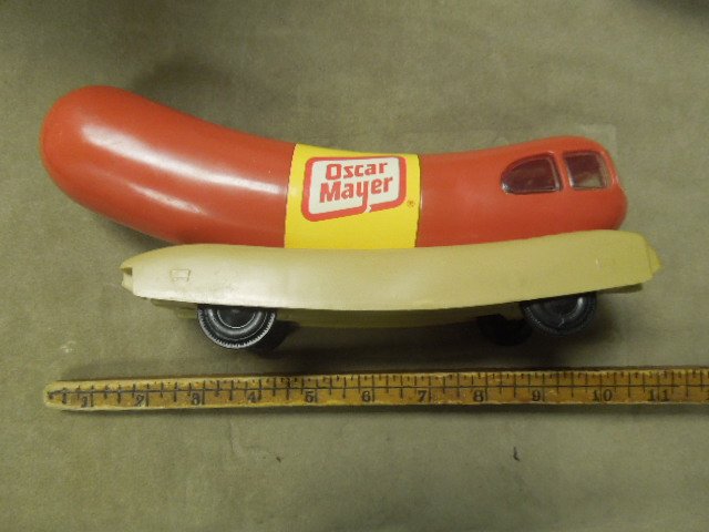 Vintage Oscar Mayer Weiner Mobile Bank: Vintage Oscar Mayer Weiner Mobile Bank, in plastic with Olympic "Proud Sponsor 1992" decal on side, 11"Condition; minor wear