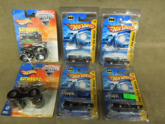 6 Hot Wheels Batmobiles: 6 Hot Wheels Batmobiles including 4- 2007 new models & 2 Monster Jam #7. Condition: All in original packaging.