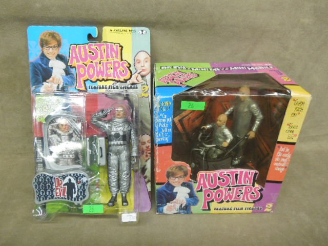 2 Austin Powers Feature Film Figures: 2 Austin Powers Feature Film Figures. includes: Dr. Evil 6", Dr. Evil & Mini Me w/ mini mobile (series 2) by McFarlane. Condition: Both in original packages, Mini Me box has wear and tear.