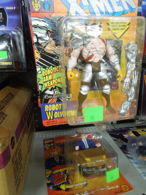 8- X-Men Action Figures: 8- X-Men Action Figures. All include Marvel Universe trading card by Toy Biz. Condition: All in original packages.