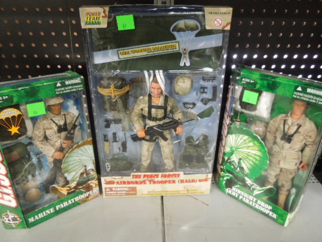 2- GI Joe & Other Action Dolls: 2- GI Joe & Other Action Dolls. Includes: Paratroopers Marine & Midnight drop army plus Peace forces (Halo) All with parachutes. Condition: In original boxes.