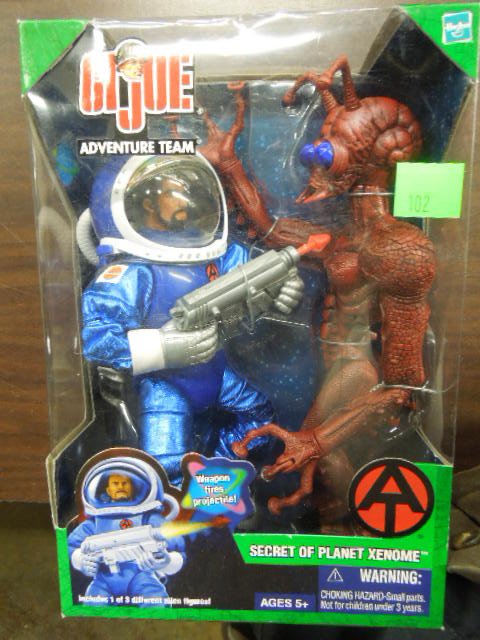 GI Joe Adventure Team Figure: GI Joe Adventure Team Figure, Secret of Planet Zenome with spacesuit, alien figure, and projectile firing weapon. Condition: In original box