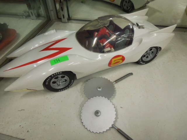 Speed Racer Plastic Mach 5 Car: Speed Racer Plastic Mach 5 Car with Spridle & Chim Chim figures & saw blades. Made by Resaurus circa 2000. Condition. Minor wear no box.
