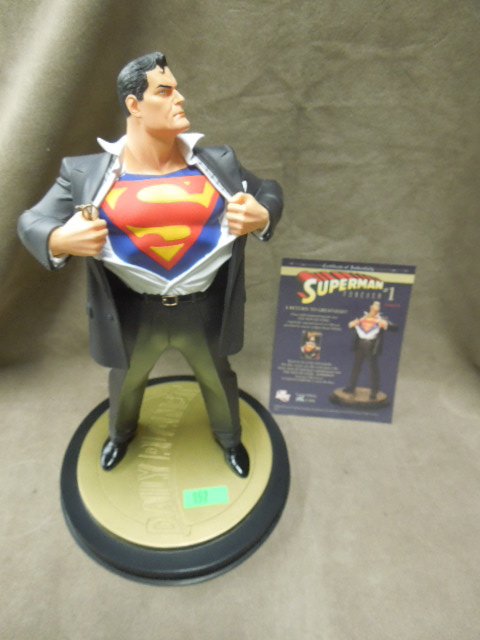 Superman Forever #1 Porcelain Statue: Superman Forever #1 cold cast Porcelain Statue by DC Comics limited edition by Karen Palinko1165 /5000 with COA. Condition: Comes with original box.
