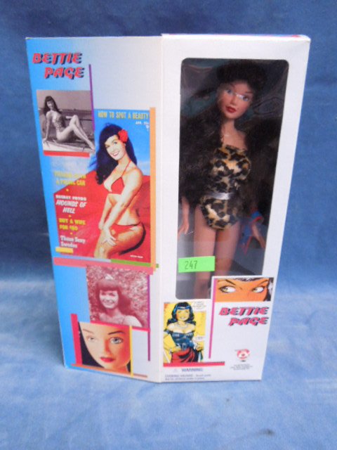 Bettie Paige Doll: Bettie Paige Doll. The great American pin up candi girl collection first in a series of great American female icons. by Hamilton Toys. Condition: New in box.