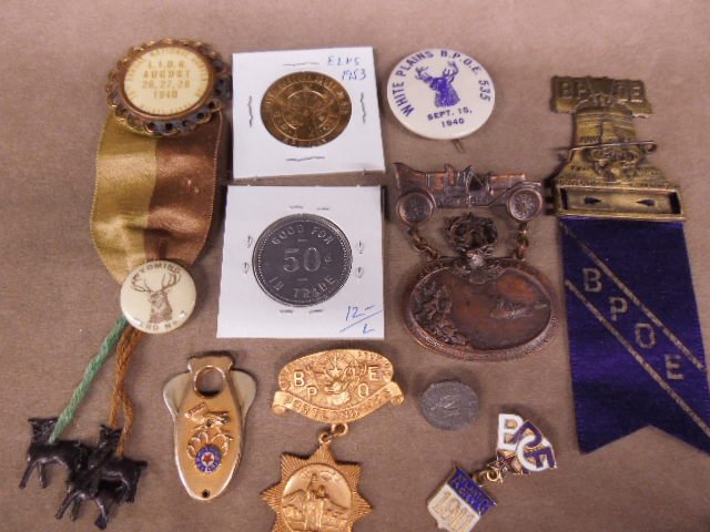 Assorted vintage BPOE medals and badges: Assorted vintage BPOE medals and badges including 1910 + 1925 Grand Lodge reunion, 1940 + 41 National Convention, 1911 Atlantic City pin, (2) souvenir coins, small cigar cutter Condition; minor wear e