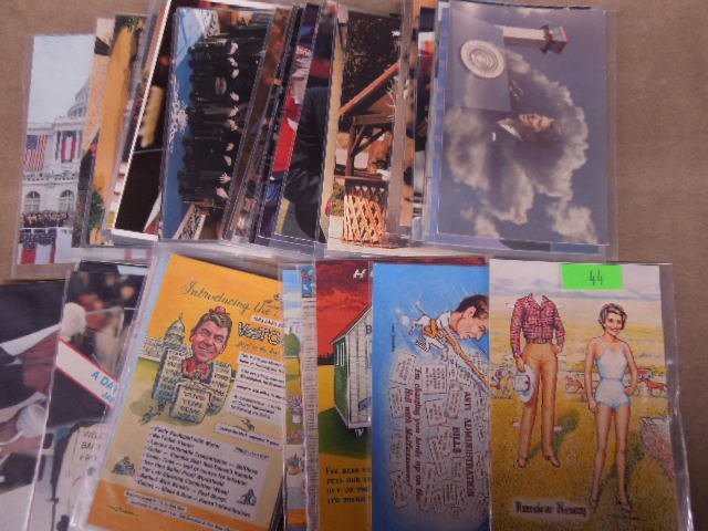 40 Reagan postcards: 40 Reagan postcards including; (8) cartoon, memorial, with heads of state, at Vietnam War memorial and other, all in plastic sleeves, (104) Condition; very minor wear especially on edges and corners