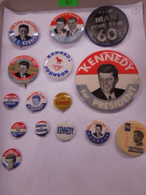 15 John F Kennedy campaign buttons: 15 John F Kennedy campaign buttons including; (6) with photo (1 with Johnson), (1) inauguration Day, (1) Flicker "The Man for the 60's, (9) Condition; some wear on 2 smaller pins, otherwise OK