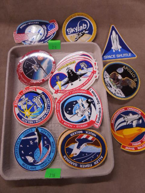 100+ Space Shuttle stickers + Apollo patch: 100+ Space Shuttle stickers, various missions, Challenger, Columbia and others, plus (1) Apollo 11 patch (eagle on moon) 4" Condition; no issues noted