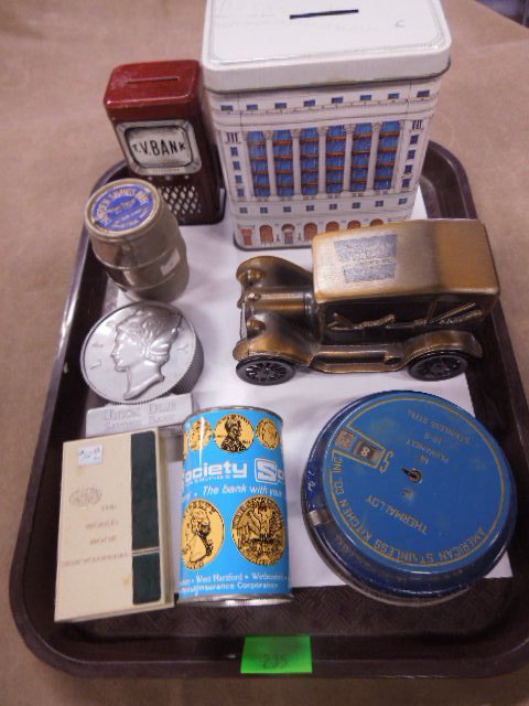 Lot of Vintage and other banks: Lot of Vintage and other banks including; American Stainless Kitchen Co. round blue coin, Amer. Bank & Trust Co. metal car, World Book Encyclopedia plastic book, Liberty Union Dime savings, Barrel and