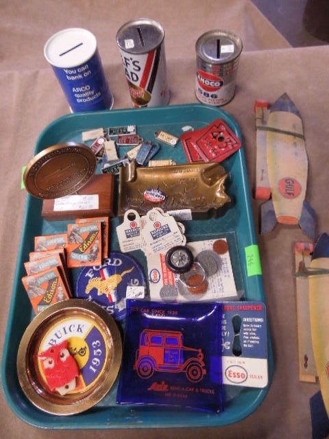 Vintage Automobile & other advertising items: Vintage Automobile & other advertising items including; banks ashtrays medals, patch, matchbook (2) metal 1942 Pa. car registration tags, license plate keychain tags, plus other Condition; some wear f
