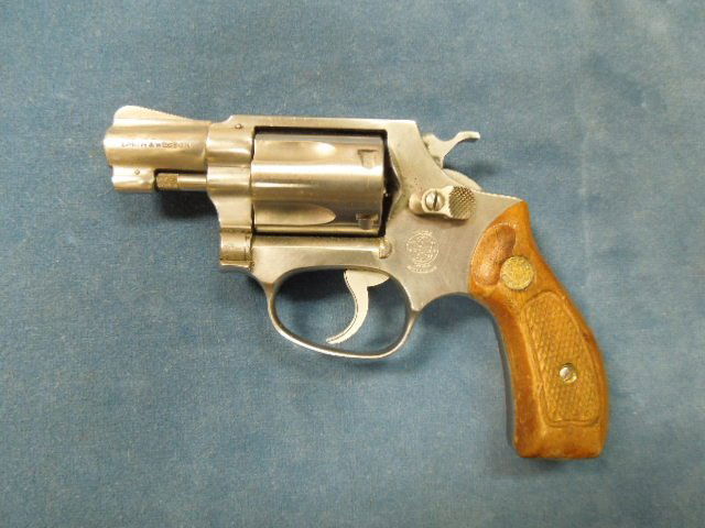 Smith & Wesson .38 Model 60 Revolver: Smith & Wesson .38 Model 60 Revolver. SER# R269279, 2" barrel, nickel finish. Condition: Fair, shows holster wear, very minor pitting in some areas, worn wood grips.