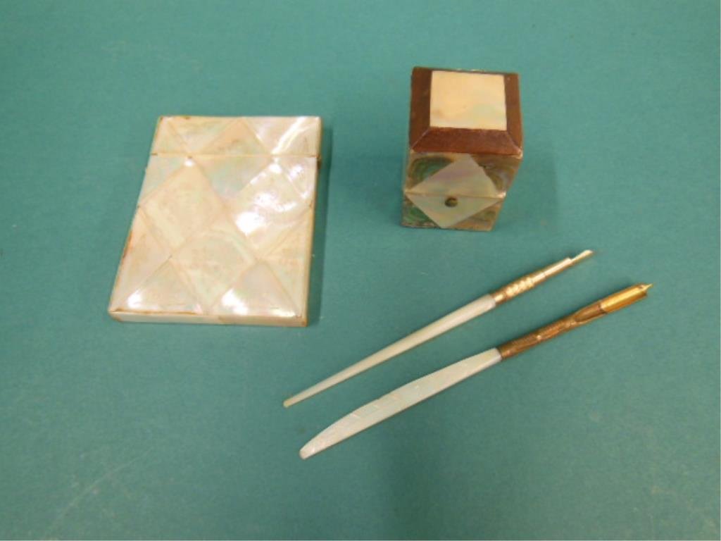 Mother of Pearl Desk Accessories: Mother of Pearl desk accessories, includes: Mother of Pearl & Abalone inlaid lift lid box with metal capped glass interior battle; scroll engraved Mother of Pearl card case, 2 Mother of Pearls pens. 1