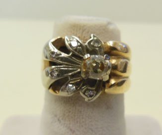 Retro 14KP TT Diamond Ring: Retro 14KP TT diamond ring, white gold floral mount w/6 accent diamonds alongside an oval mine cut approx 40+ pt diamond, 3.5 DWT, size 3 3/4. CONDITION: Modest wear.