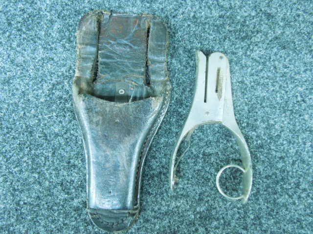 Conductor's ticket punch with leather case: Conductor's ticket punch with leather case, R. Woodman Mfg. Boston Mass. 4 1/2" Condition; leather case has wear, punch has some surface wear