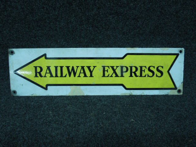 Enamel Railway Express sign: Enamel Railway Express sign, 6 1/8" x 23", single sided with mounting holes Condition; minor surface rust and repainted enamel loss