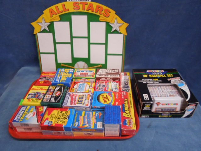 Lot Baseball cards in packs: Lot Baseball cards in packs 80's and 90's including; Fleer, Topps and other, Woolworth, Kmart, KayBee and other store packs, Micro , Update and Traded cards, some packs sealed, plus 1993 Toys R Us Sto