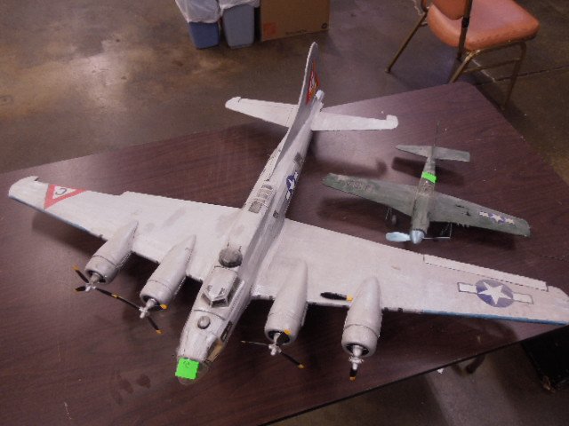 2 Paper mache / balsa wood hand made planes: 2 Paper mache / balsa wood hand made planes. 1- Single prop 15" and 1- thunderbird 4 prop 33" Cond: Parts missing and some damage throughout both pieces