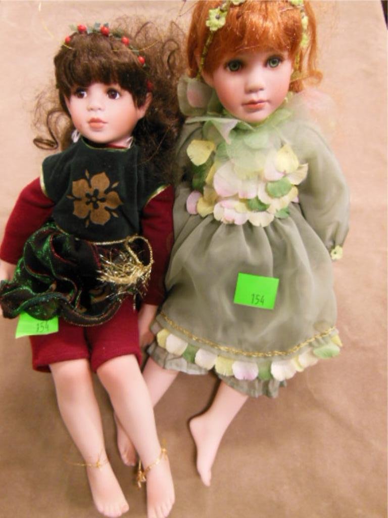 2 Porcelain Elf dolls: 2 Porcelain Elf dolls makers name on back of necks and numbered. 15" Cond: minor wear to porcelain surfaces