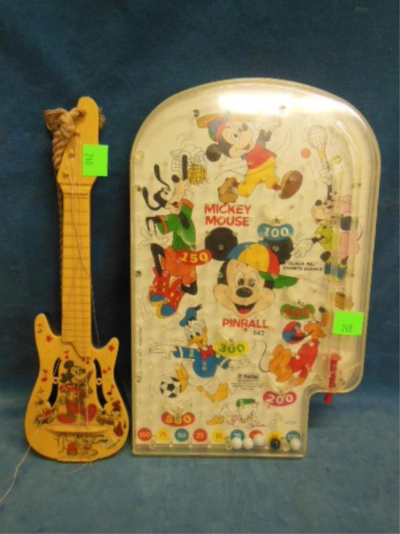 Mickey mouse plastic guitar and pinball machine (1 of 4)