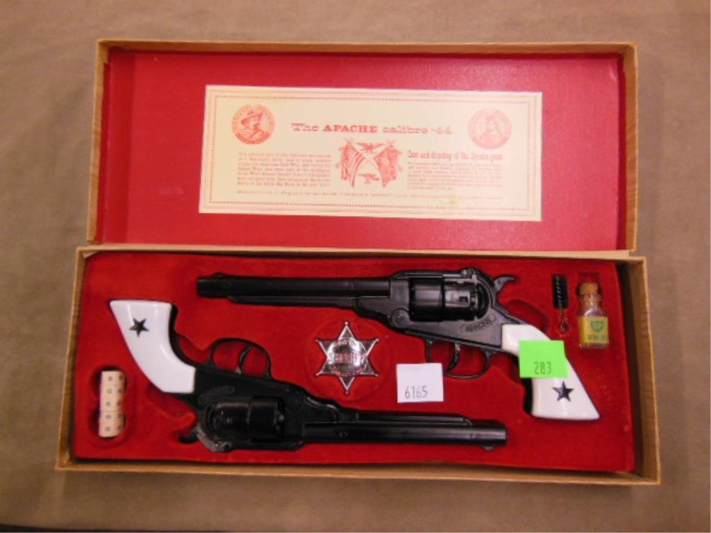 Apache .44 cap guns: The Apache calibre .44 cap guns, in original box with caps, sheriff badge, BP gun oil and brush Condition; minor wear from age