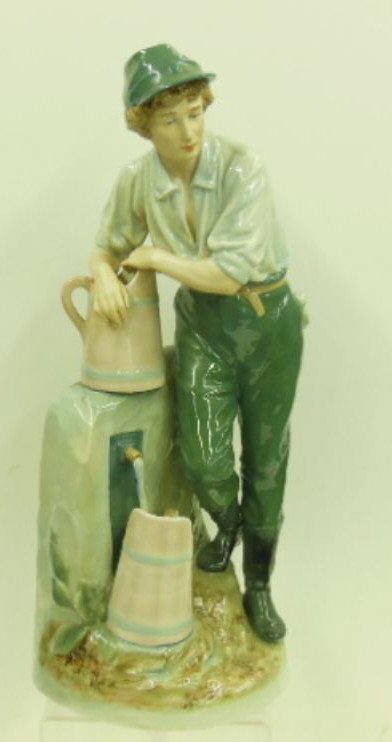 Royal Dux Boy at Well Sculpture: Early to mid 20th c. Royal Dux porcelain 23 1/4" (h) x 8 1/2" (l) x 7" (w) Boy at Well sculpture. [41] CONDITION: Very good condition with no damage.