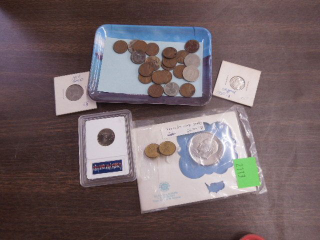 2 Error Coins & Others: Two Error coins; 1950-D clipped dime; 1960 nickle w/boxed O; twenty Wheat cents; 1909 VOB penny p/n; nickels; 1971 Ike dollar w/space envelope; 1960-1 Jefferson Nickle.