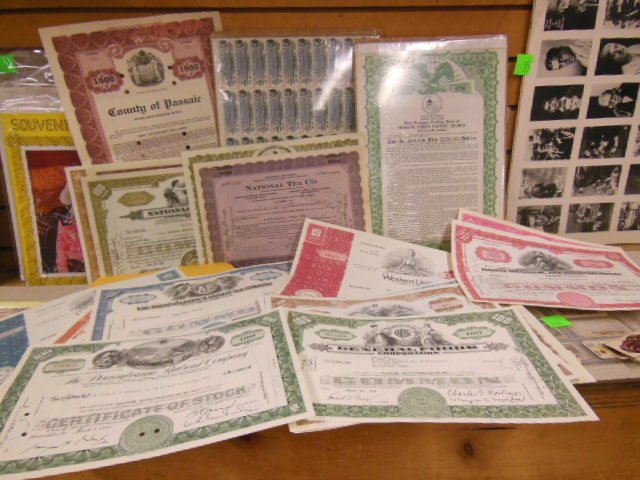 24 Vintage stock certificates: 24 Vintage stock certificates including; Nation Tea Co. New York Central RR, United stores, Watham Watch, Great Atlantic & Pacific Tea Co. Western Union, Chicago, Rock Island & Pacific RR, PRR, Genera