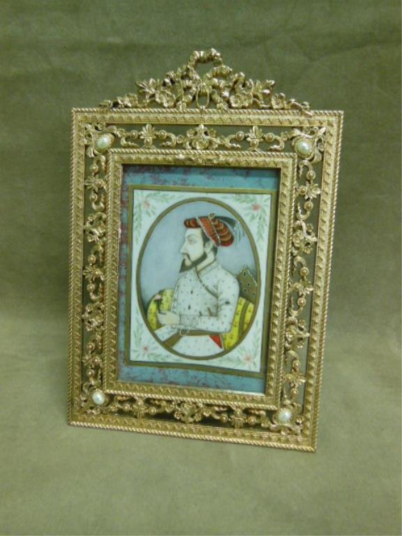 Antique Painting on Bone Panel: Antique hand painted 3 3/4"(h) x 3"(d) painting on bone panel depicting a Persian nobleman with floral designs, set into a contemporary gilt metal 8" (h) x 5 1/2"(d) picture frame. CONDITION: Very goo