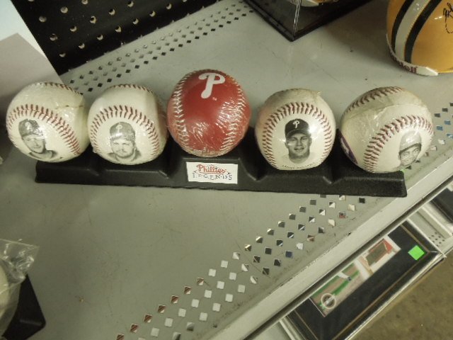 4 Phillies fotoballs & Phillies baseball: 4 Phillies fotoballs including; Duncan, Dykstra, Kruk and Greene, with Phillies baseball on custom stand Condition; all balls in sealed clear plastic bags