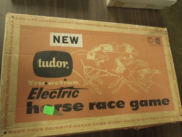 Tudar electric horse race game: Tudar Tru action electric horse race game in original box Condition; wear to box, missing (1) horse, untested
