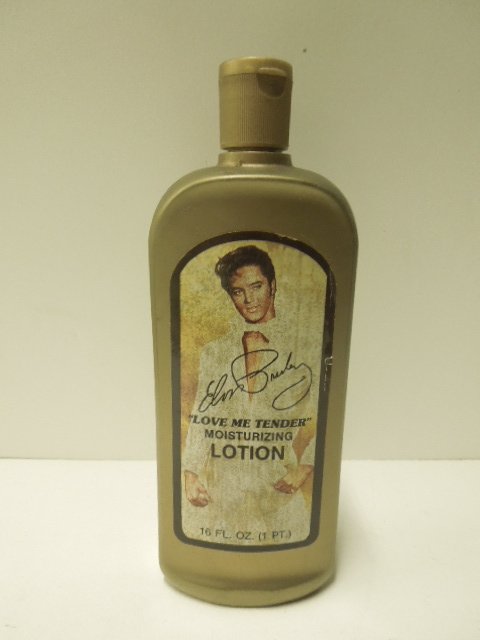 Elvis Pressley Moisturizing Lotion: 1985 Elvis Pressley Enterprises Inc. full & unused 16 oz. bottle of Elvis Pressley “Love Me Tender” Moisturizing Lotion. CONDITION: Wear & or tearing on front & back labels.