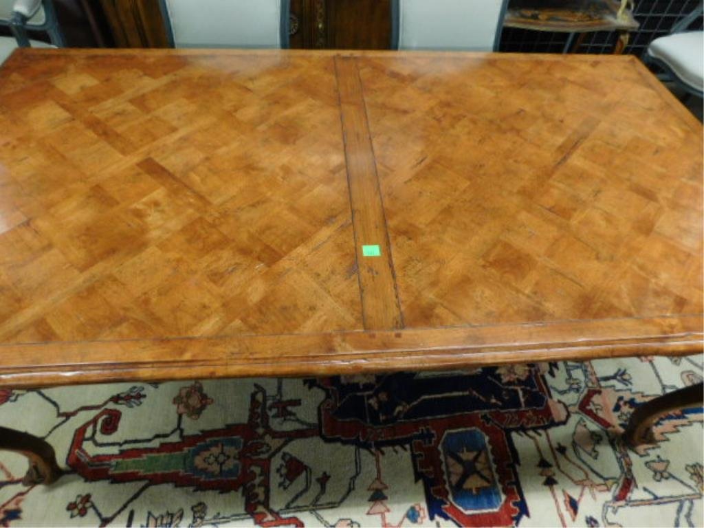 Country French Dining Room Table: Distressed Fruitwood, Country French dining room table, molded edge parquetry top over a shaped & scroll carved apron & 4 acanthus & scroll carved cabriole legs, includes: two 21" wide leaves, 20th C.