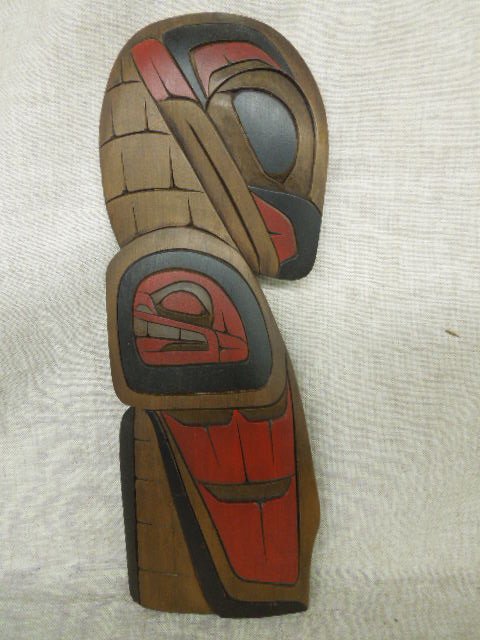 Glen Edwards "Eagle-face of Whale" Plaque: Contemporary 20th C. Glen Edwards signed Native American Indian Coast Salish Nation (Vancouver Island, B.C.) carved wood 16" (height) x 5" (length) "Eagle-face of Whale" plaque. CONDITION: Very good c