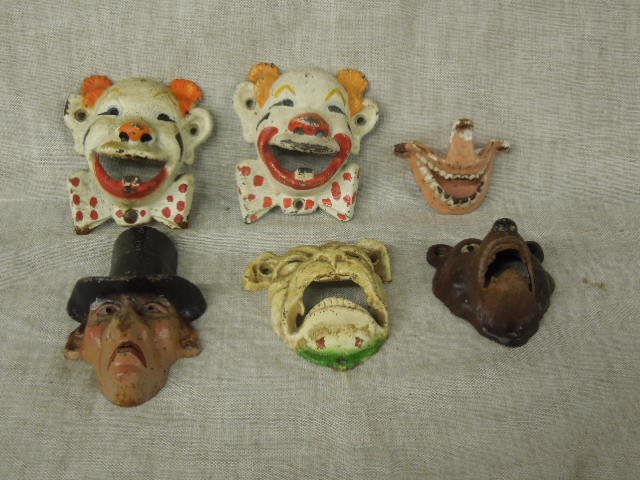 Cast Iron Figural Bottle Openers: Lot of 6 circa 1940s-1950s John Wright Co. & Wilton Products painted cast iron wall novelty bottle openers includes: 2 1/4" (height) x 3 1/2" (length) x 2" (width) teeth, 3 3/4" (height) x 3 1/4" (len