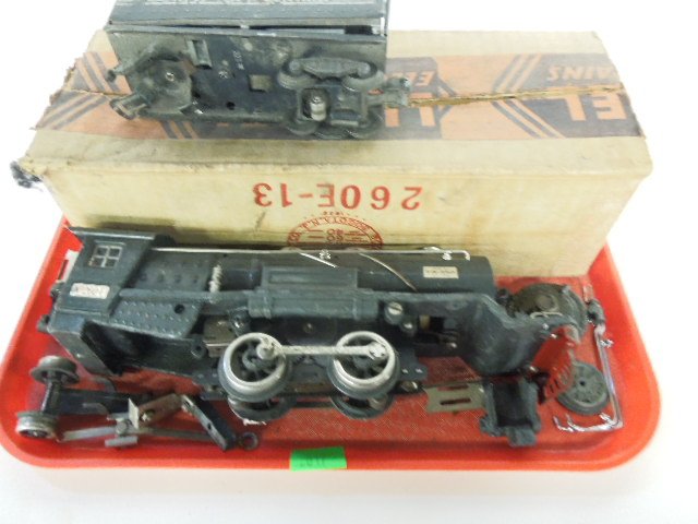 Lionel No 260-E Locomotive (parts): Partially disassembled with parts off, have original Lionel shipping box, NYC tender, coming apart and missing back set of wheels. CONDITION: Apart, not sure all parts are there.