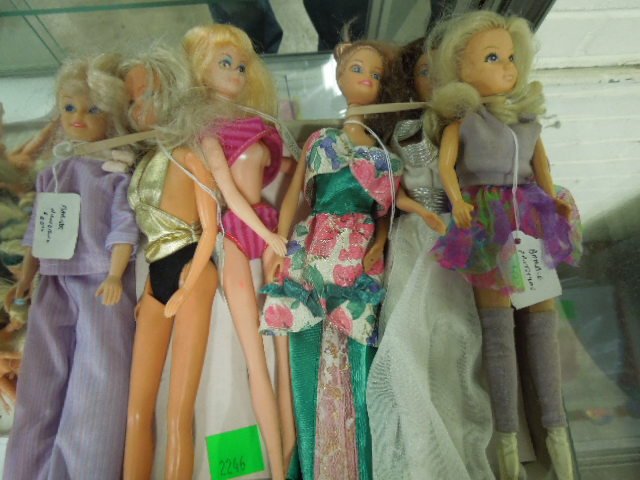 (6) Barbie Proto Type Dolls: In outfits, all have no shoes except one with hard plastic ballet shoes (attached to legs, not over feet). CONDITION: Minor wear.