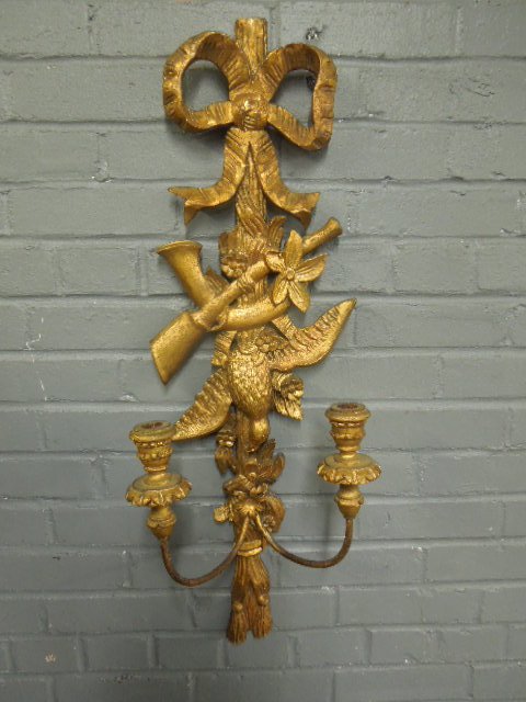 Rococo Wall Sconce: Rococo wall sconce, carved and gilt wood depicting ribbon, game bird, horn and flowers, mid 20th c. 32" x 11" x 7 1/2". CONDITION: modest wear to gilt surfaces.