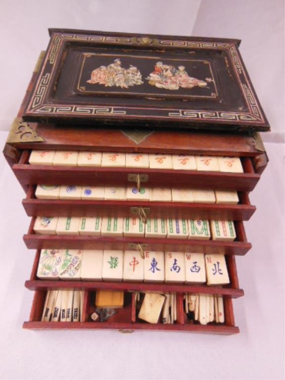 Vintage Chinese Mahjong Set: Vintage Chinese bone and bamboo tile mahjong set in a 6 1/4" (height) x 9" (length) x 6" (width) wood carrying case with brass handles and mounts. CONDITION: Replaced hand painted lacquer front panel 