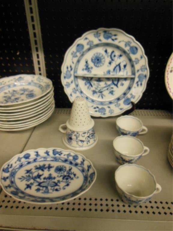 Messen Blue Onion Partial China Service: Antique Messen Porcelain Blue Orion pattern (oval and X backstamp marked) 32 piece partial china service includes: (10) 9 7/8" (length) large rim soup bowls (oval), (6) 9 7/8" (length) dinner plates (