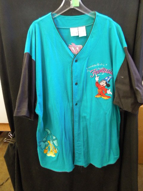 Fantasia Hand Stitched Long Shirt: Shirt, 100% cotton (XXL) featuring: hand stitched Mickey Sorcerer on front pocket, Fantasia character hand stitched on back, blue with black sleeves. CONDITION: No issues identified.