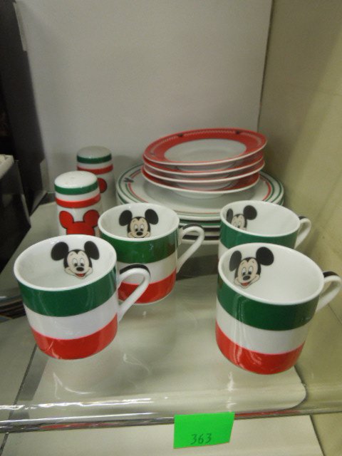 14 Pc Gourmet Mickey China: Fourteen piece gourmet Mickey china including: four dessert platters, four cups and saucers and salt and pepper, red, white and green (Italian) with Mickey face. CONDITION: No issues identified.