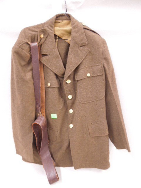 WW II US Army Dress Jacket & Belt: WW II U.S. Army dress jacket and belt, size 44R. CONDITION: Fair, very minor moth damage and dirt.