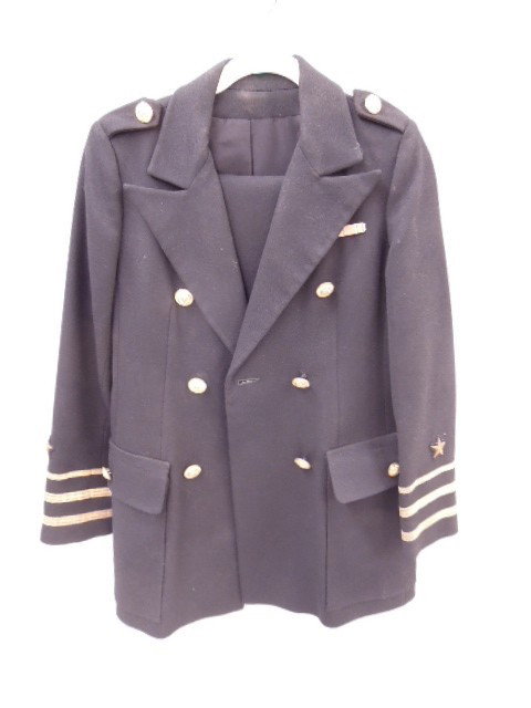 US Naval Commander Dress Uniform: U. S. Naval Commander dress uniform. Includes: jacket and pants. Size twelve pants., no jacket size noted. CONDITION: Good, minor wear.